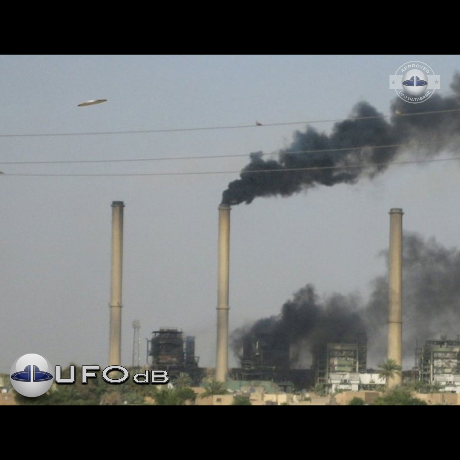 The flying saucer is flying over an industrial factory in Baghdad UFO Picture #58-1