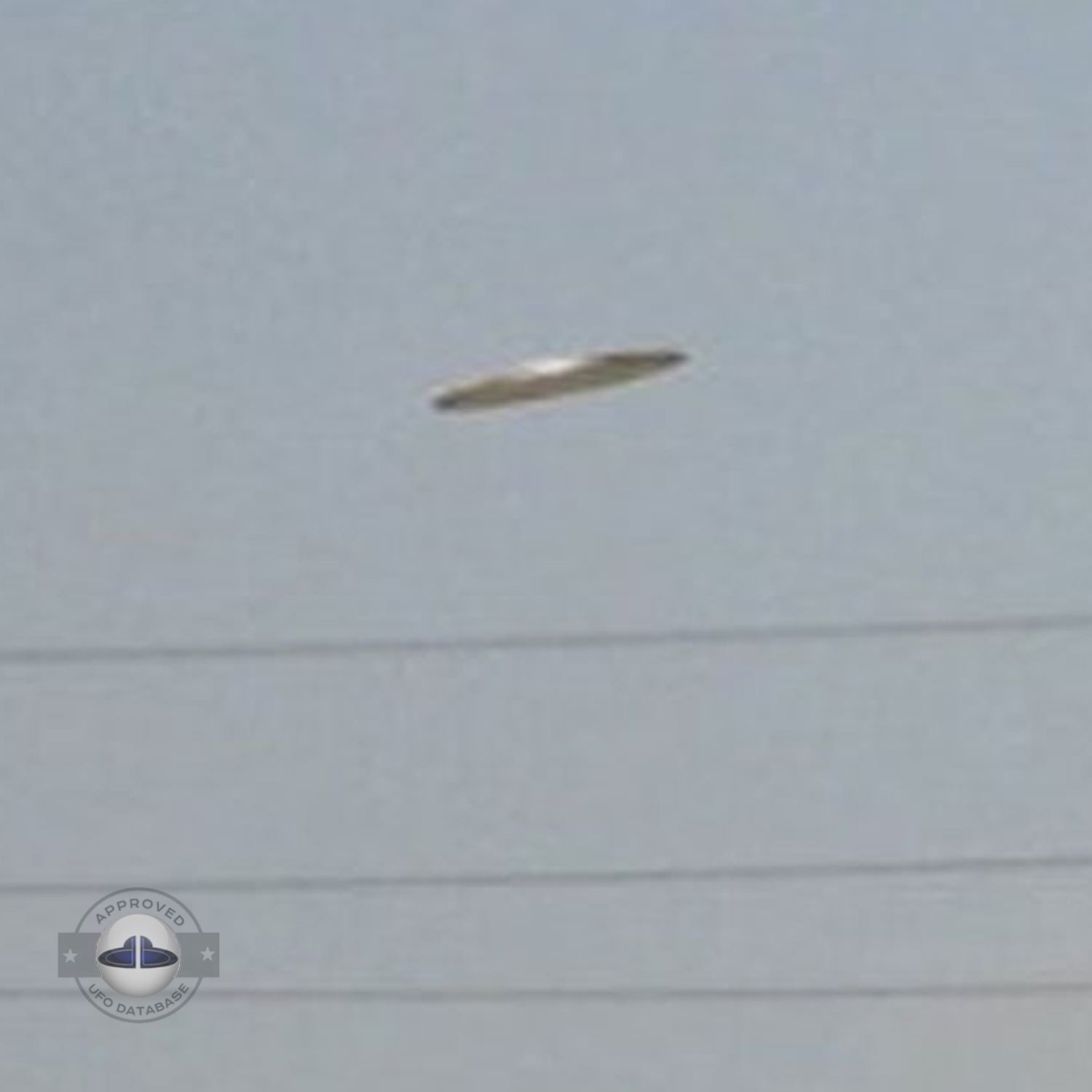 The flying saucer is flying over an industrial factory in Baghdad UFO Picture #58-4