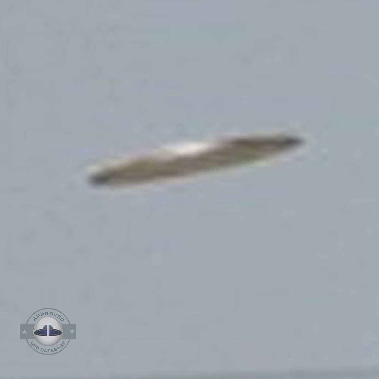 The flying saucer is flying over an industrial factory in Baghdad UFO Picture #58-5
