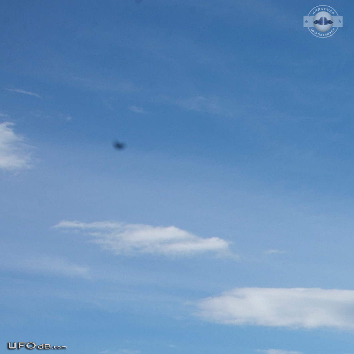 Stationary dark UFO over ohope beach near Whakatane NZ 2015 UFO Picture #600-2