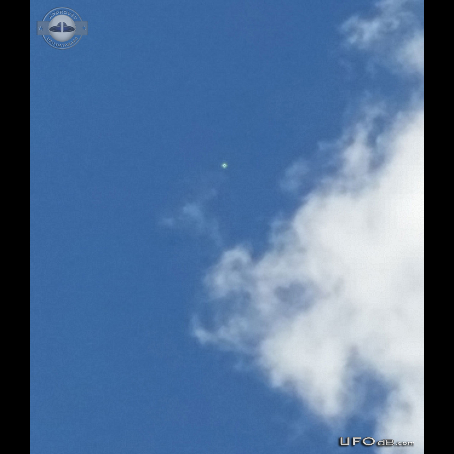 Looked up and saw an bright UFO hovering - Miami Florida USA 2014 UFO Picture #622-1