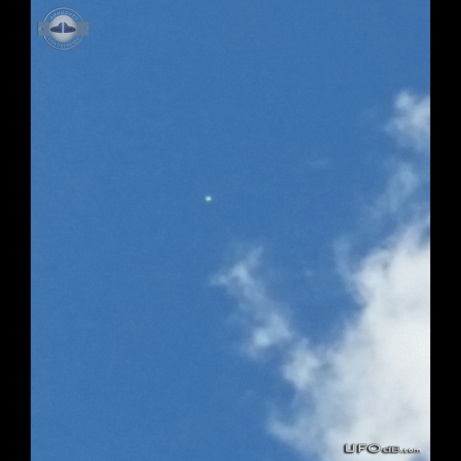 Looked up and saw an bright UFO hovering - Miami Florida USA 2014 UFO Picture #622-2