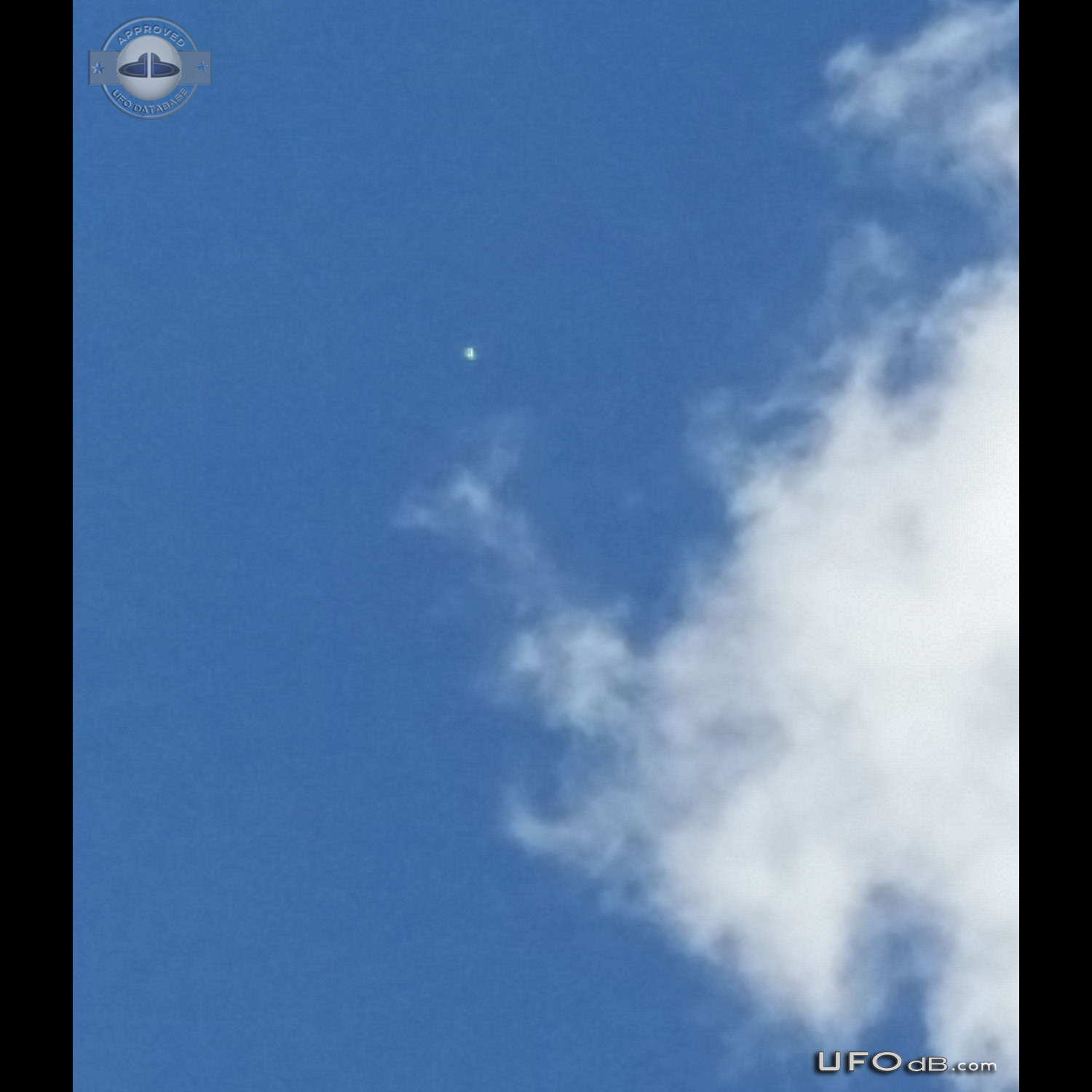 Looked up and saw an bright UFO hovering - Miami Florida USA 2014 UFO Picture #622-3