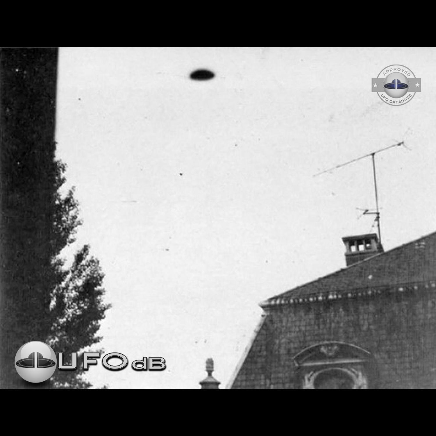 UFO Picture showing UFO beside city house with antenna Nancy Lorraine UFO Picture #64-1
