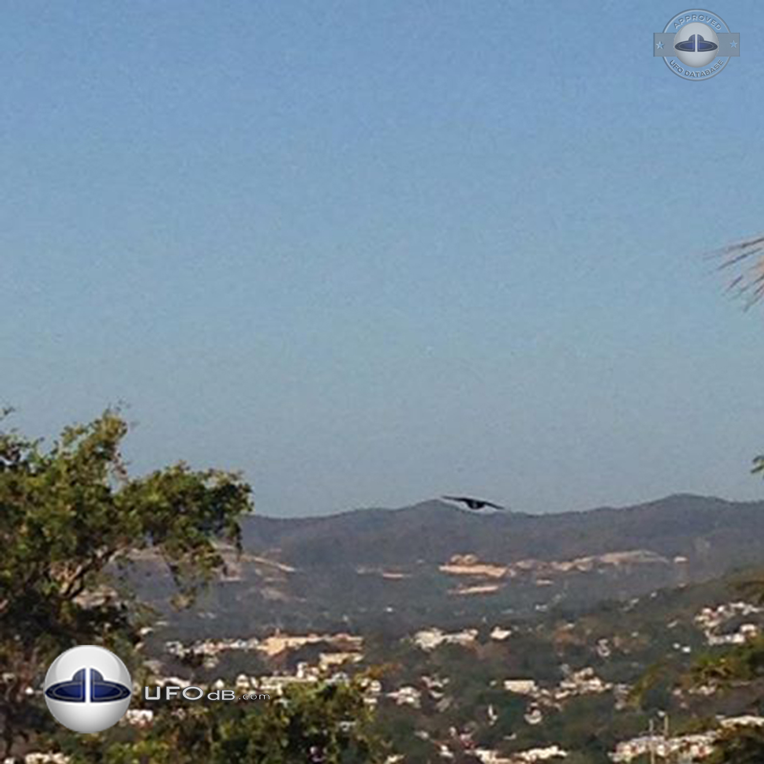 UFO is stationary above a walmart over Ponce in Puerto Rico March 2015 UFO Picture #667-1
