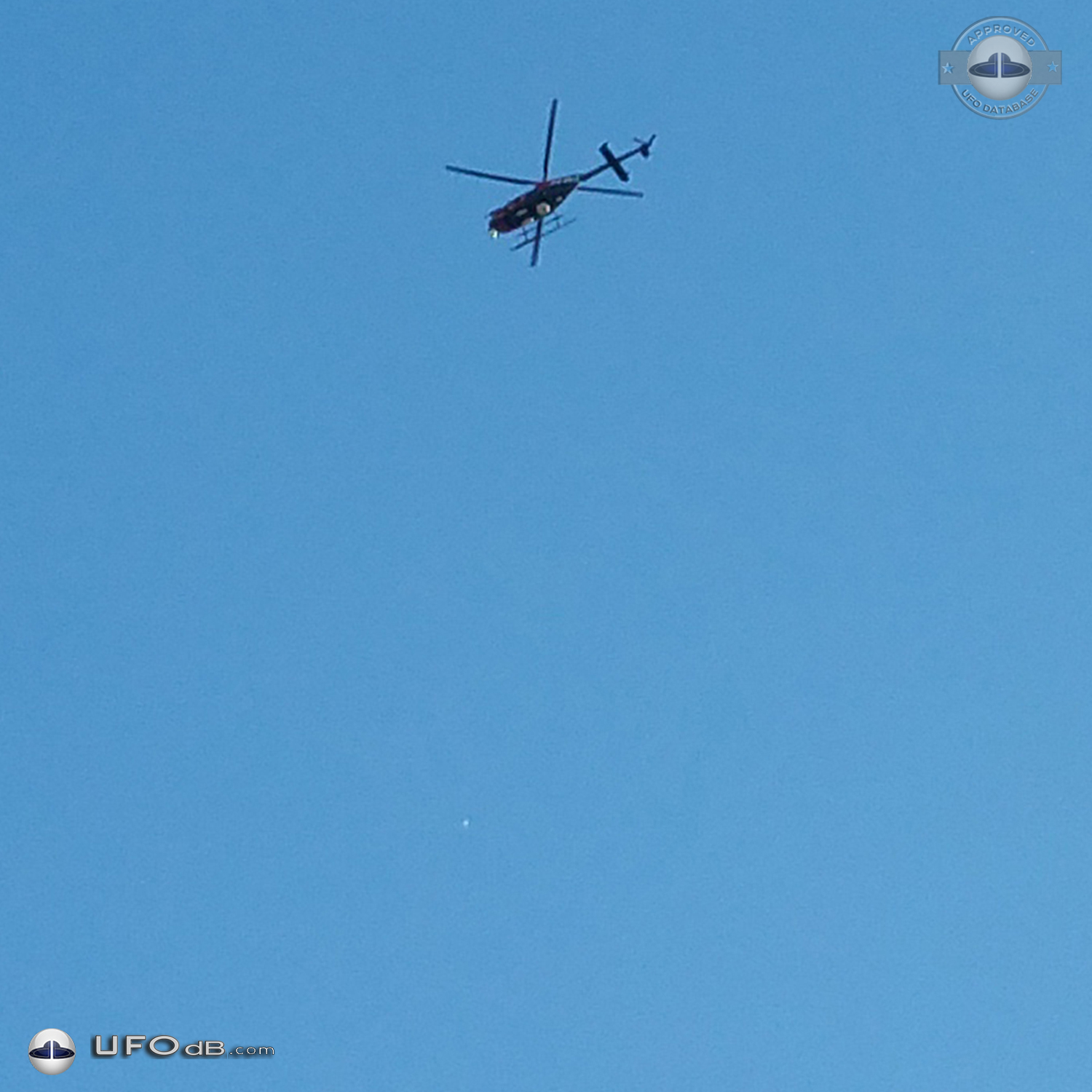 heard a helicopter and looked up and saw a shiny ball that was moving UFO Picture #672-2