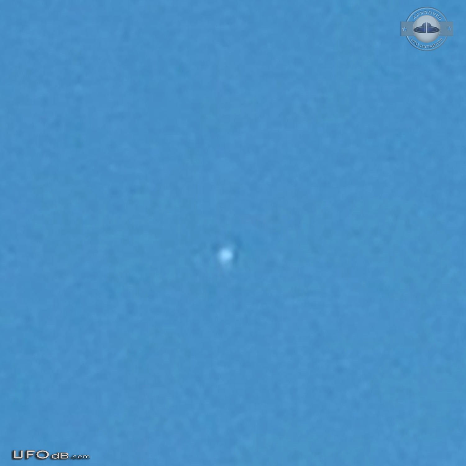 heard a helicopter and looked up and saw a shiny ball that was moving UFO Picture #672-4