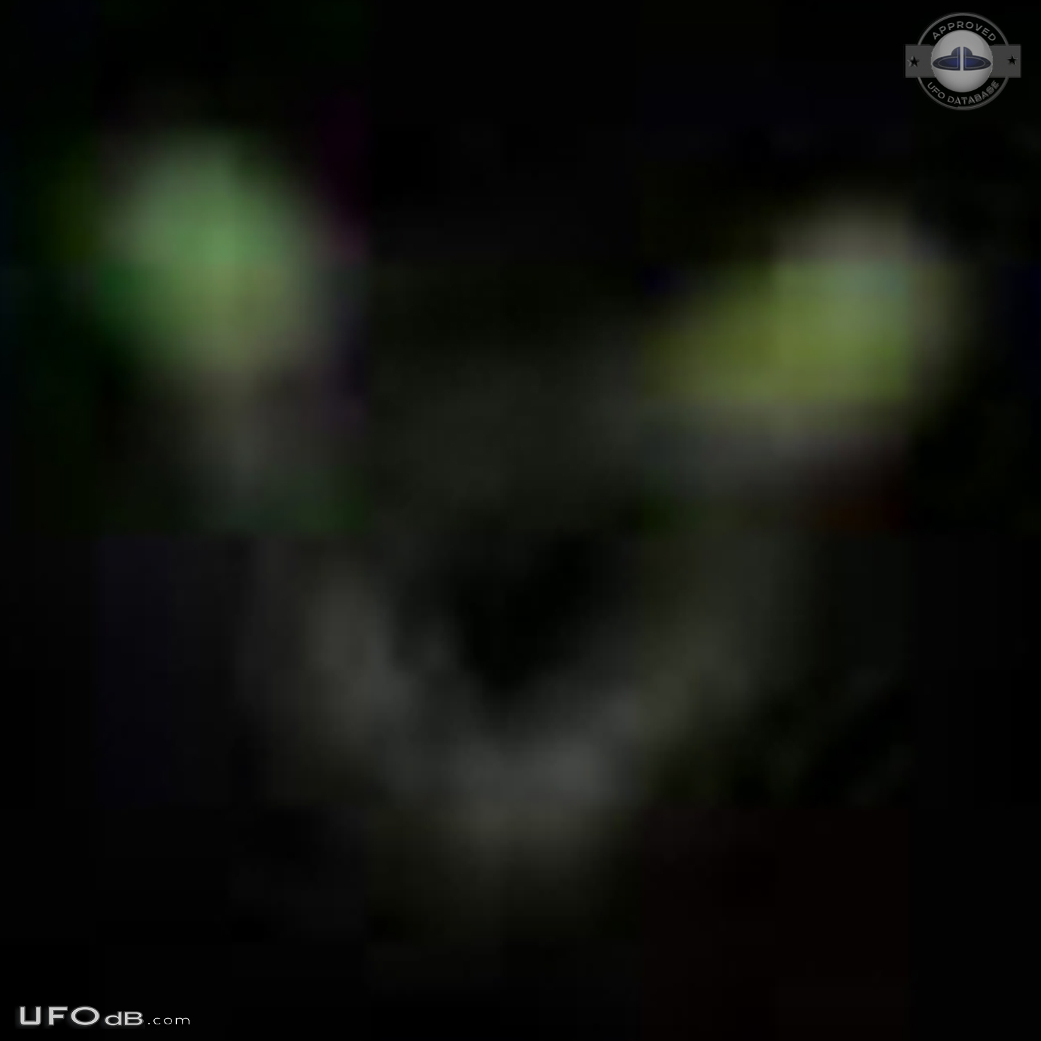 Circular UFO with 2 glowing green lights seen in Huddersfield UK 2011 UFO Picture #688-4