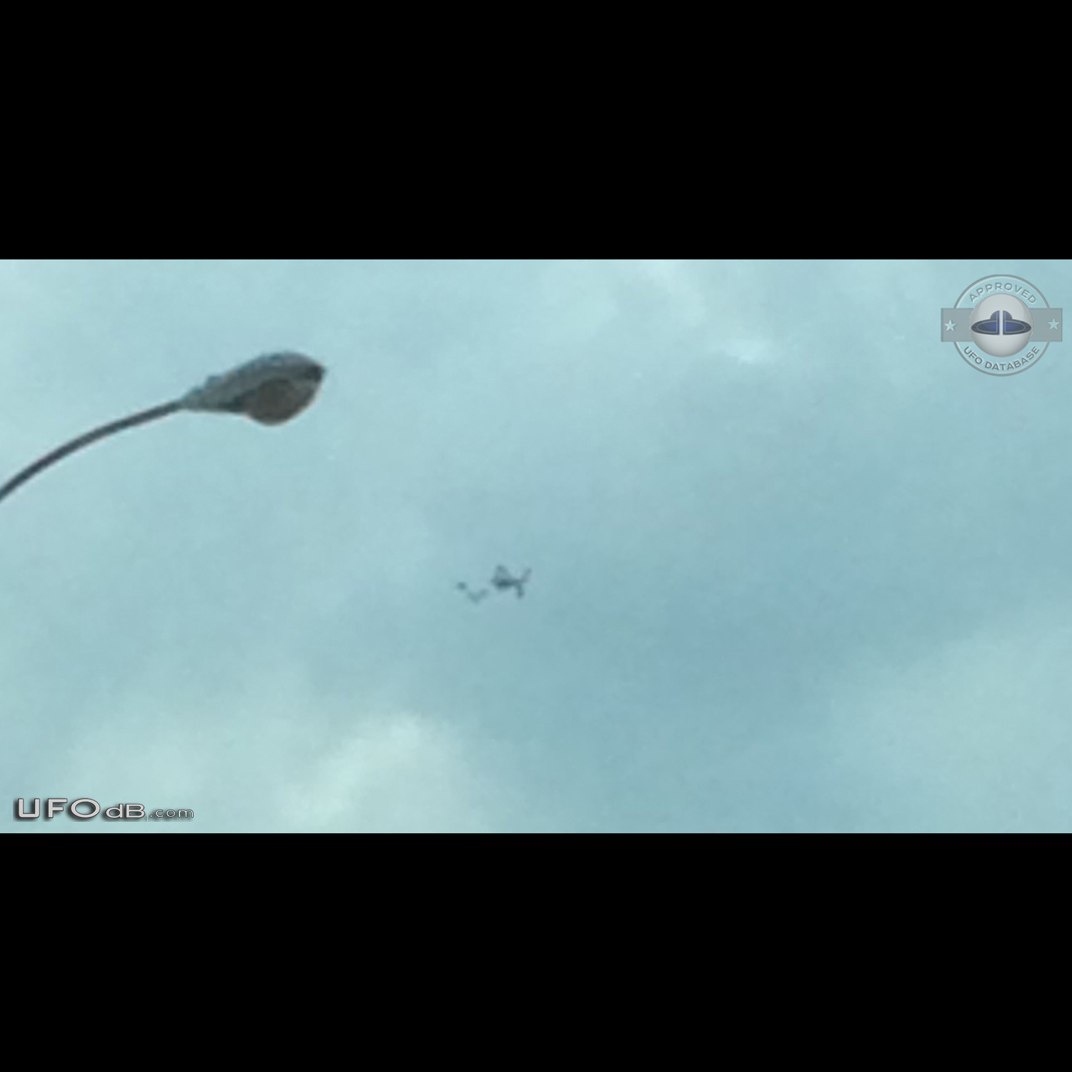 Drove past on highway, saw it floating outside, then took Pictures UFO Picture #693-1