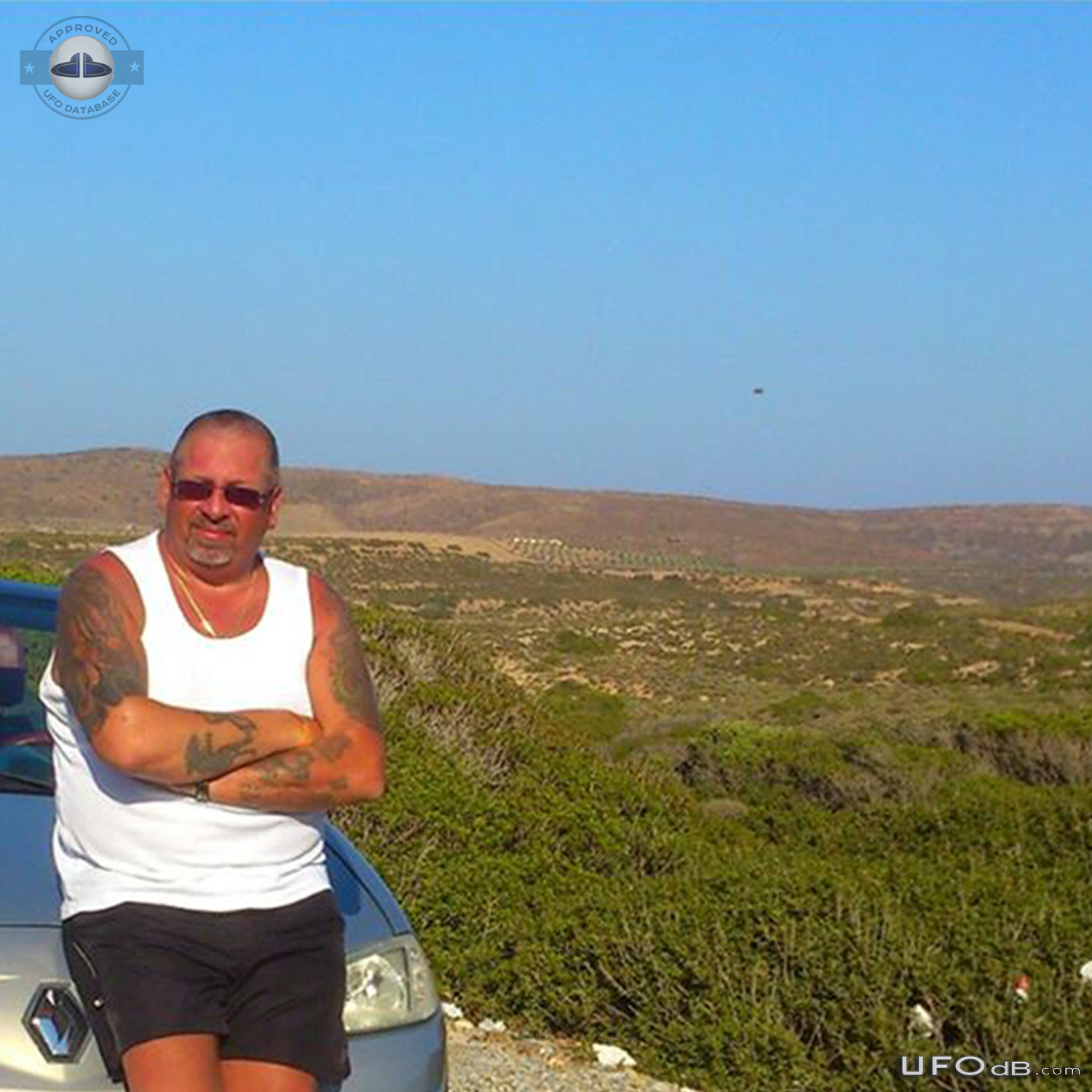 Grey saucer UFO caught on picture over Sitia, Crete Greece in 2014 UFO Picture #697-2