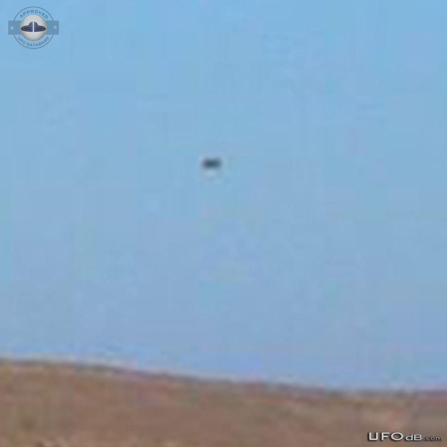 Grey saucer UFO caught on picture over Sitia, Crete Greece in 2014 UFO Picture #697-4
