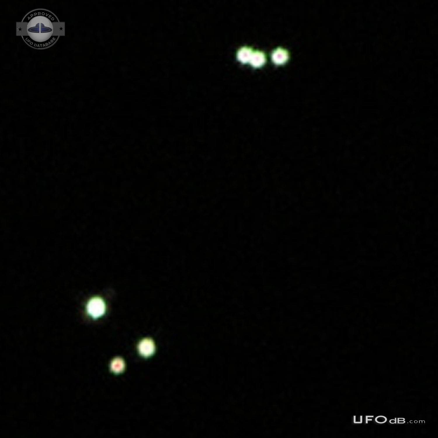 Multiple UFOs alternately flashing and circling each other in groups - UFO Picture #712-1