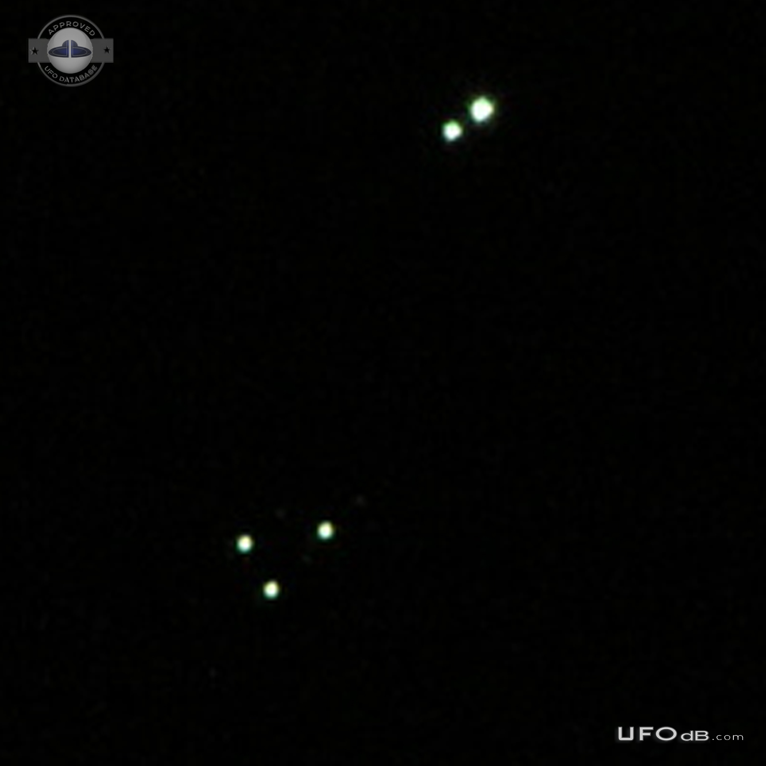 Multiple UFOs alternately flashing and circling each other in groups - UFO Picture #712-4