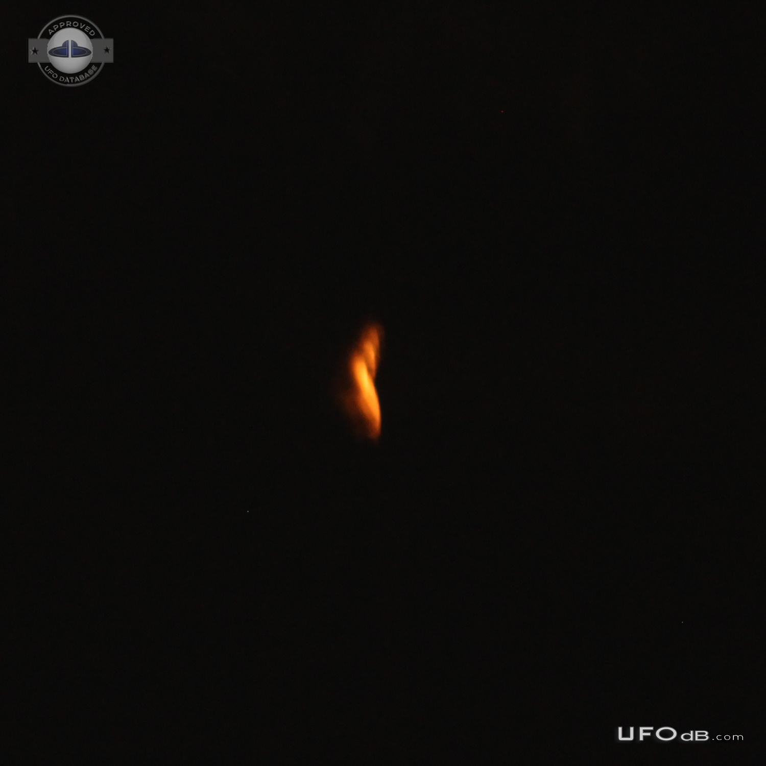 Orange flame like glow UFO, only discernable as solid in photos - Laus UFO Picture #713-2