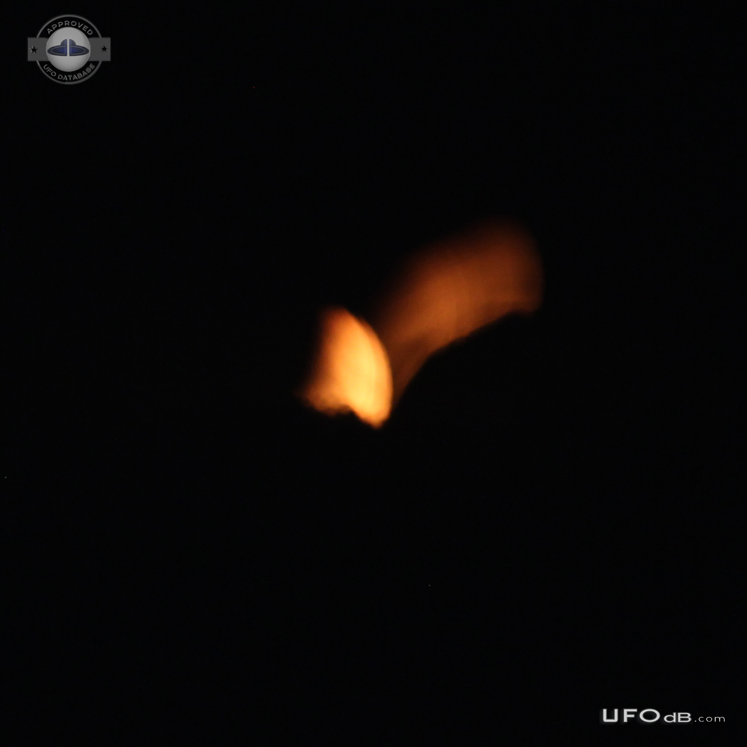 Orange flame like glow UFO, only discernable as solid in photos - Laus UFO Picture #713-3