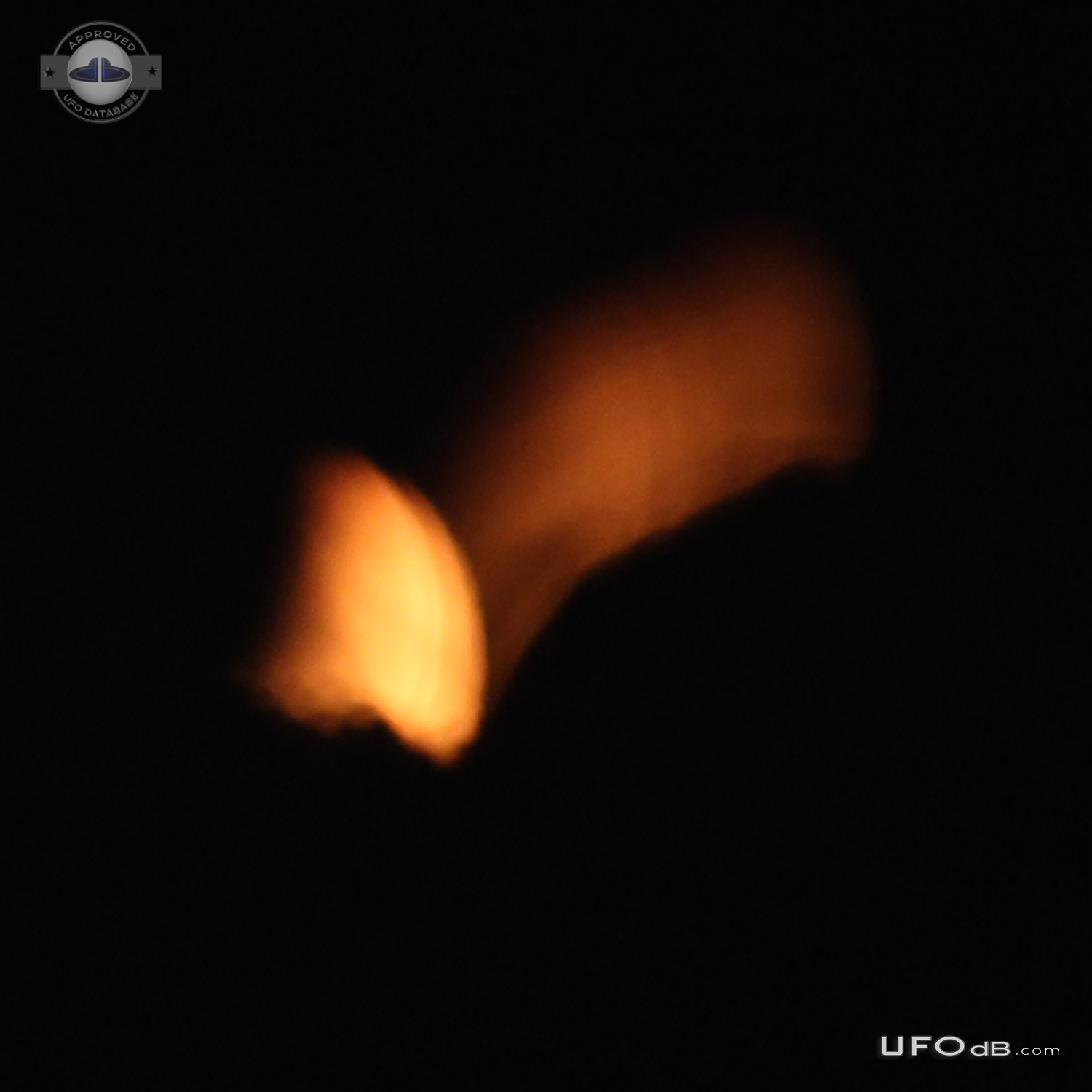 Orange flame like glow UFO, only discernable as solid in photos - Laus UFO Picture #713-4
