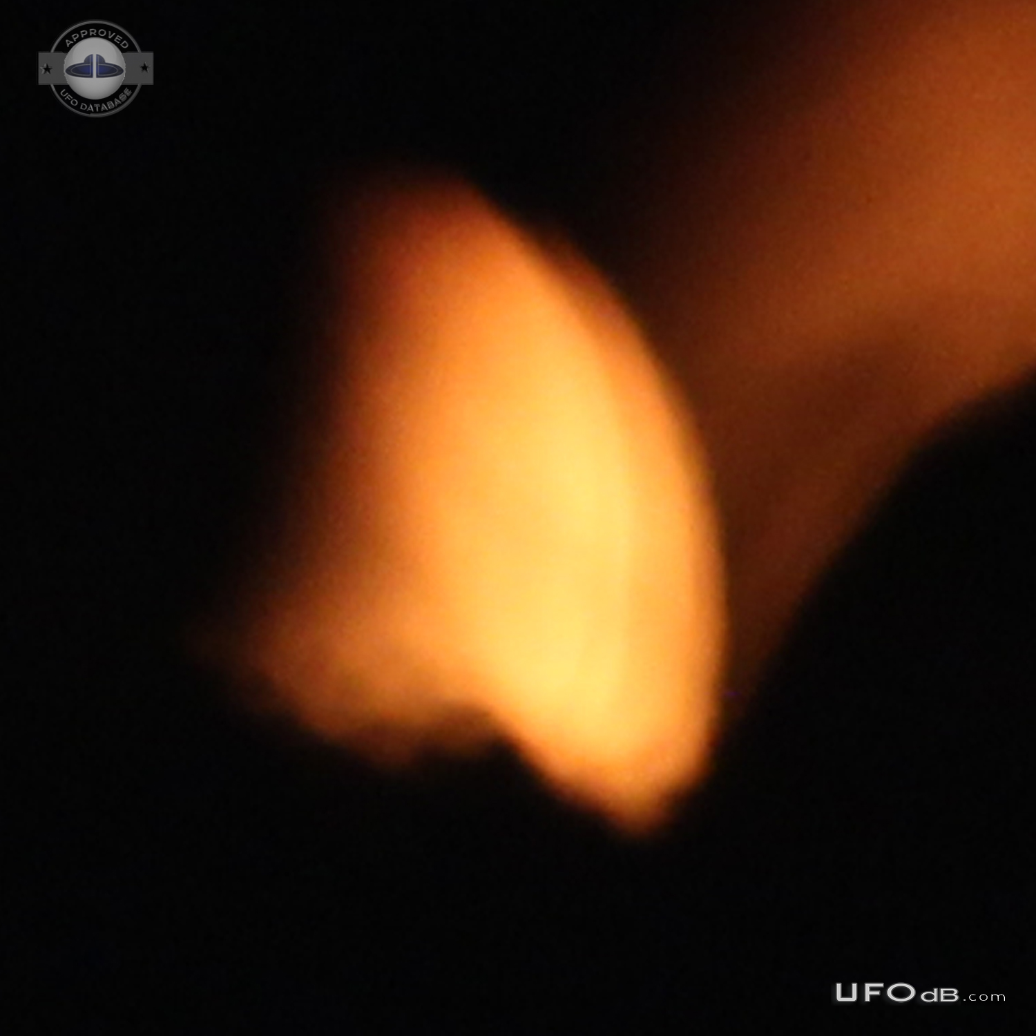 Orange flame like glow UFO, only discernable as solid in photos - Laus UFO Picture #713-5