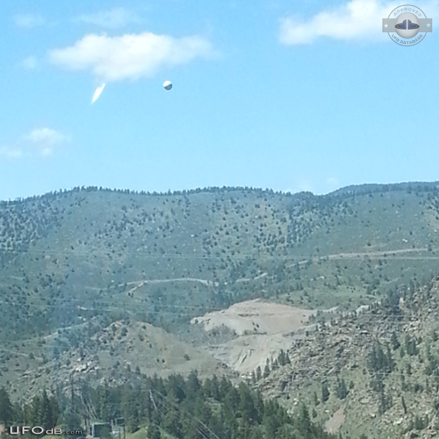 Picture of vacationing in Denver Colorado get UFO sphere in the Sky -  UFO Picture #720-3