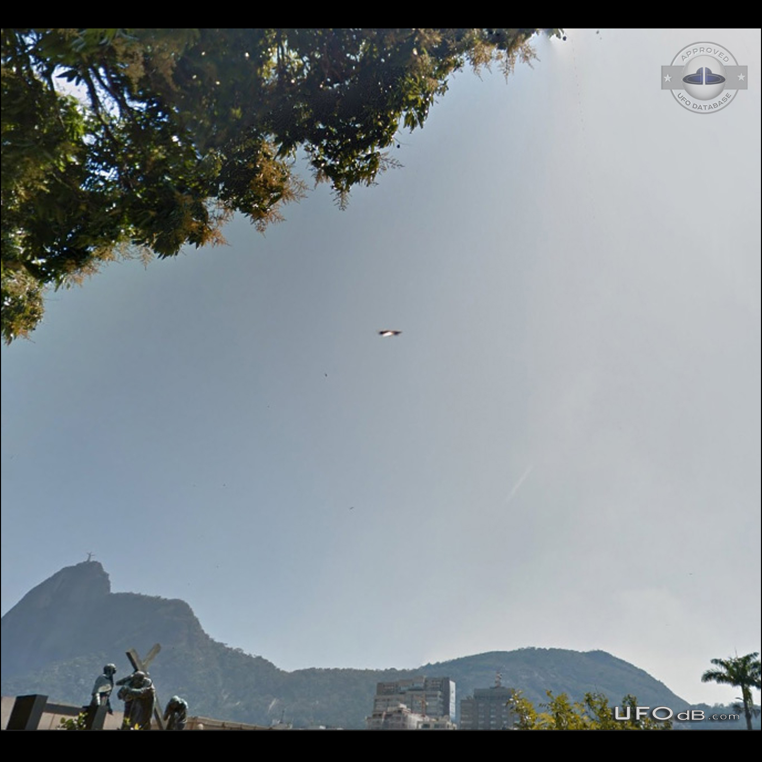 Metallic UFO flying over cemetery in Rio de Janeiro Brazil September 2 UFO Picture #725-1