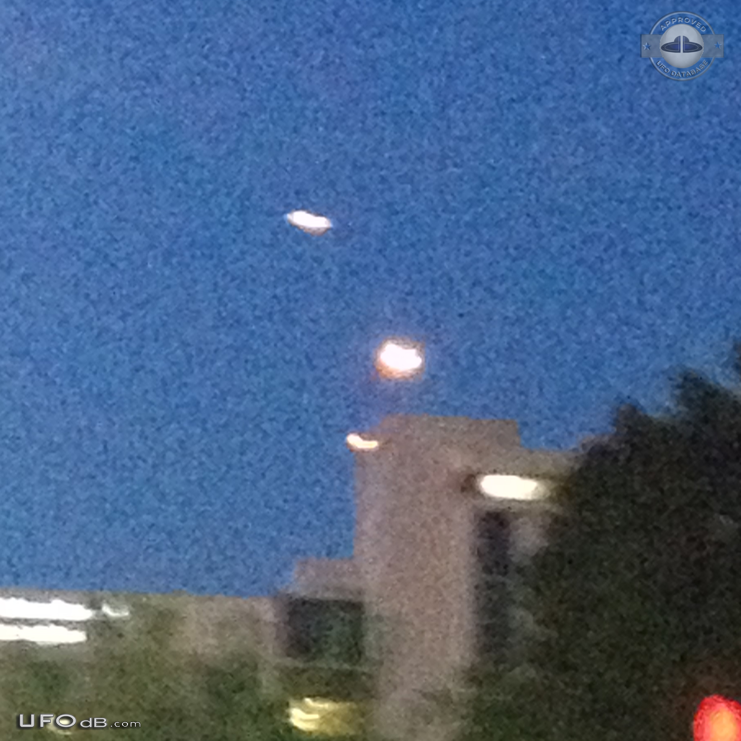 Luminescent dome shaped UFO with red light at its base Los Angeles USA UFO Picture #730-4