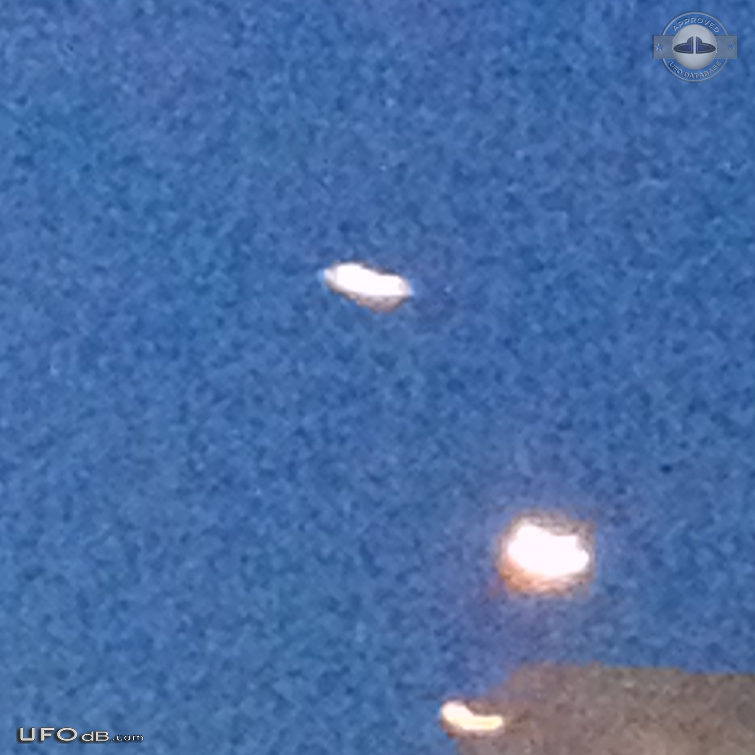 Luminescent dome shaped UFO with red light at its base Los Angeles USA UFO Picture #730-5