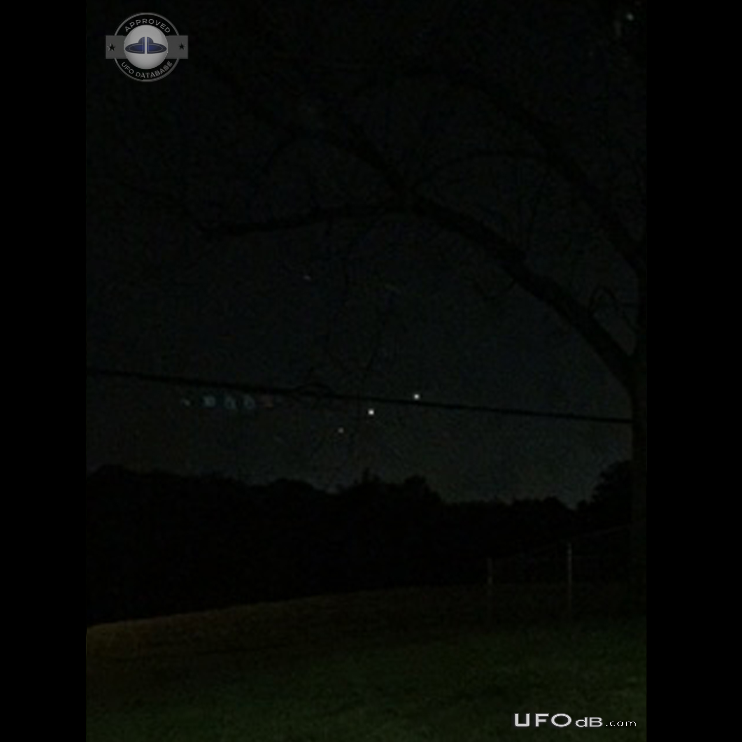Perfect line of hovering UFOs low to ground - Hazelwood Missouri 2015 UFO Picture #737-2