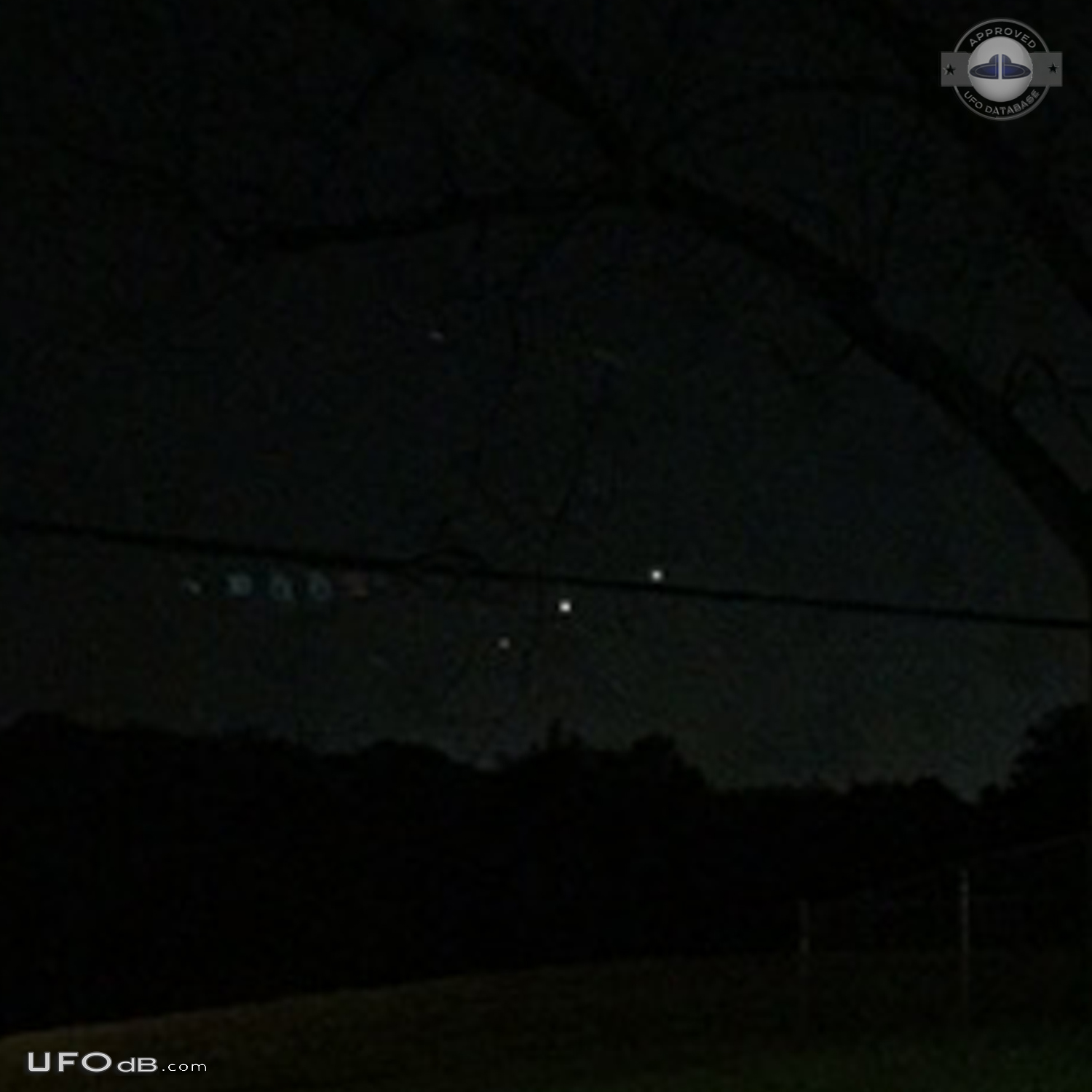 Perfect line of hovering UFOs low to ground - Hazelwood Missouri 2015 UFO Picture #737-3