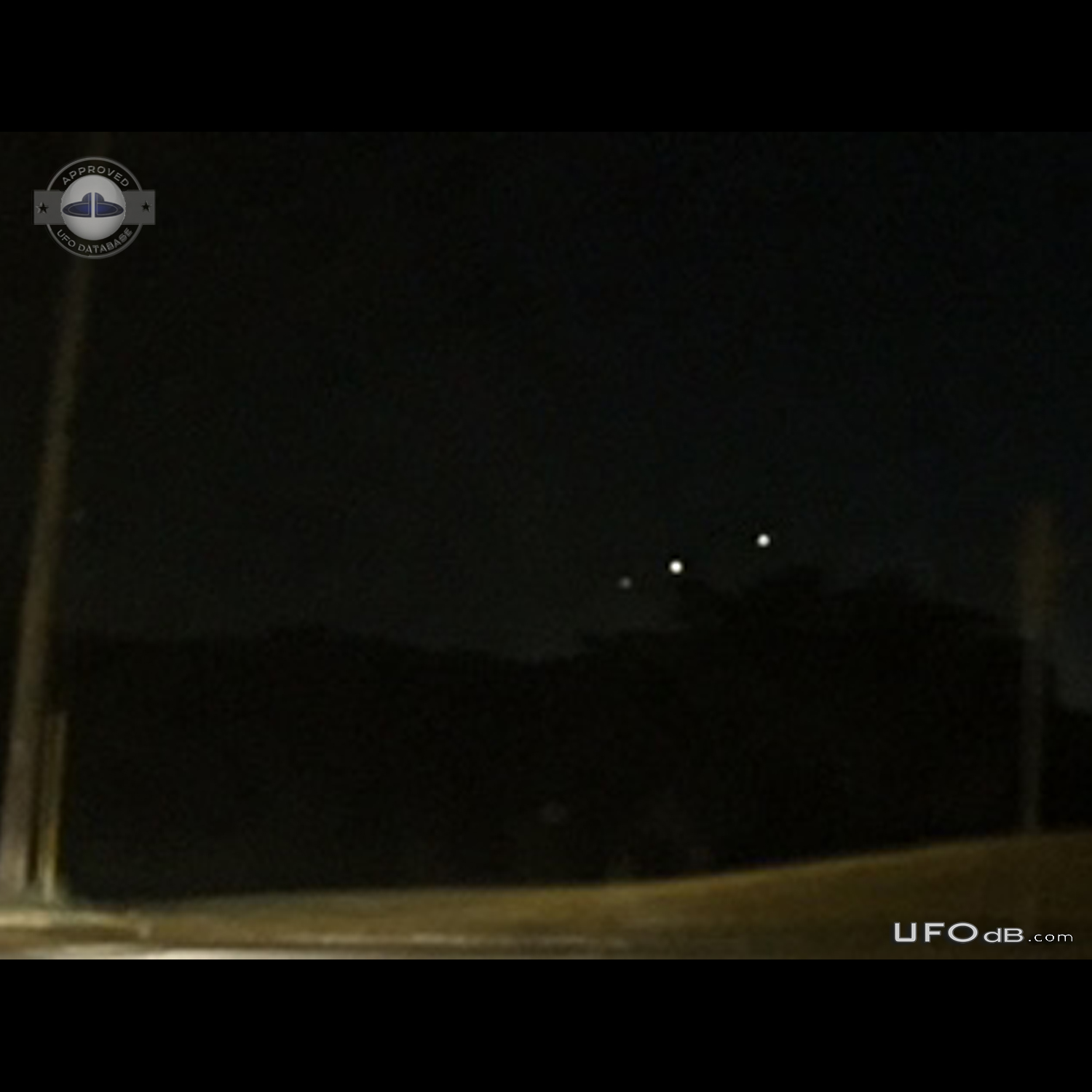 Perfect line of hovering UFOs low to ground - Hazelwood Missouri 2015 UFO Picture #737-4