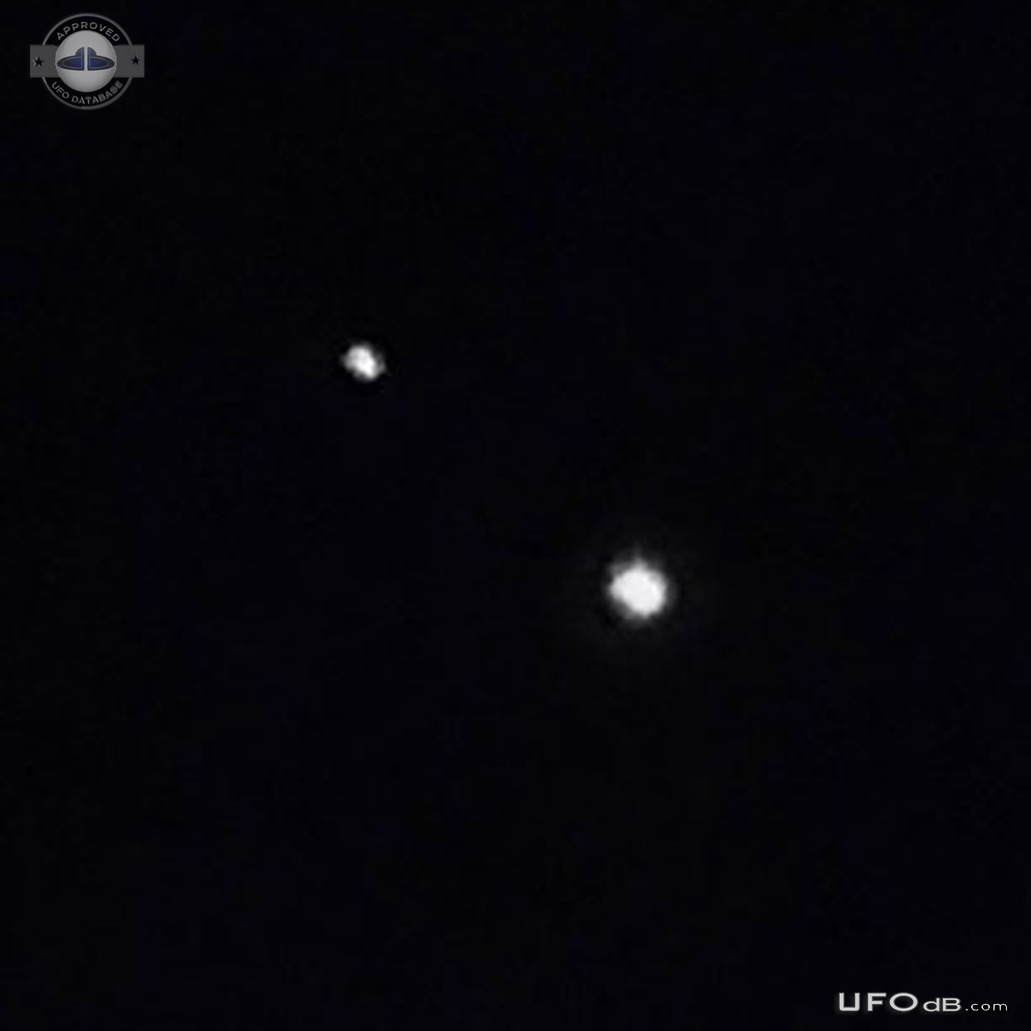 2 extremely bright lit objects stationary in sky for lenghthy period UFO Picture #744-2