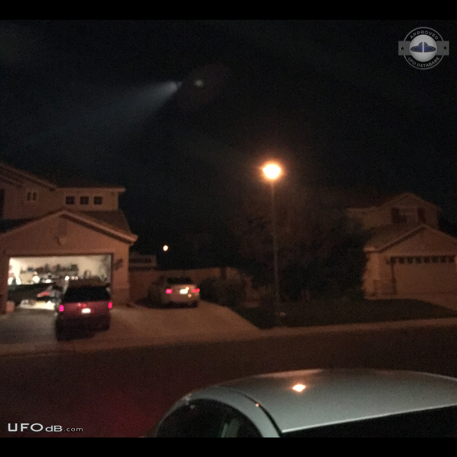 Coming out of my house saw UFO in the sky with a long beam of light -  UFO Picture #758-1