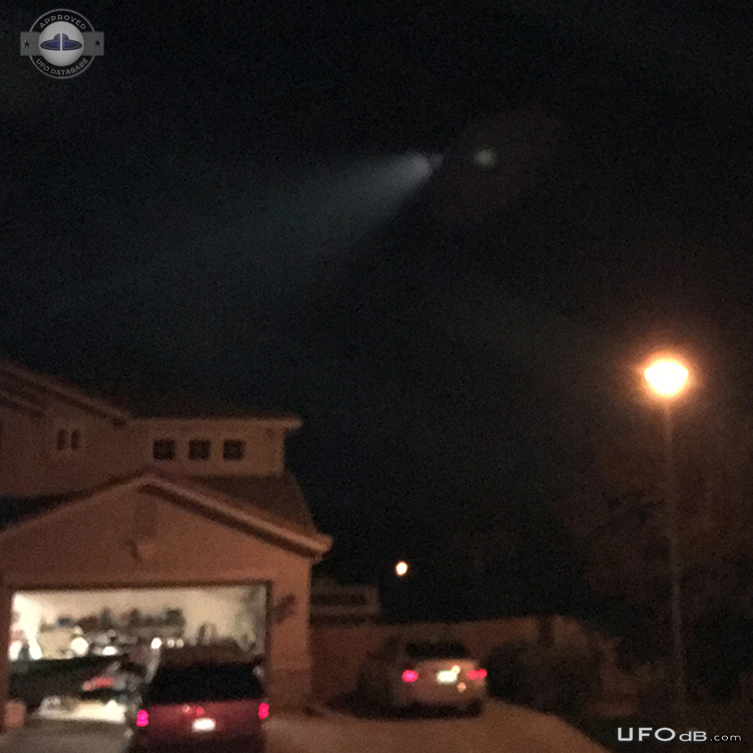 Coming out of my house saw UFO in the sky with a long beam of light -  UFO Picture #758-2
