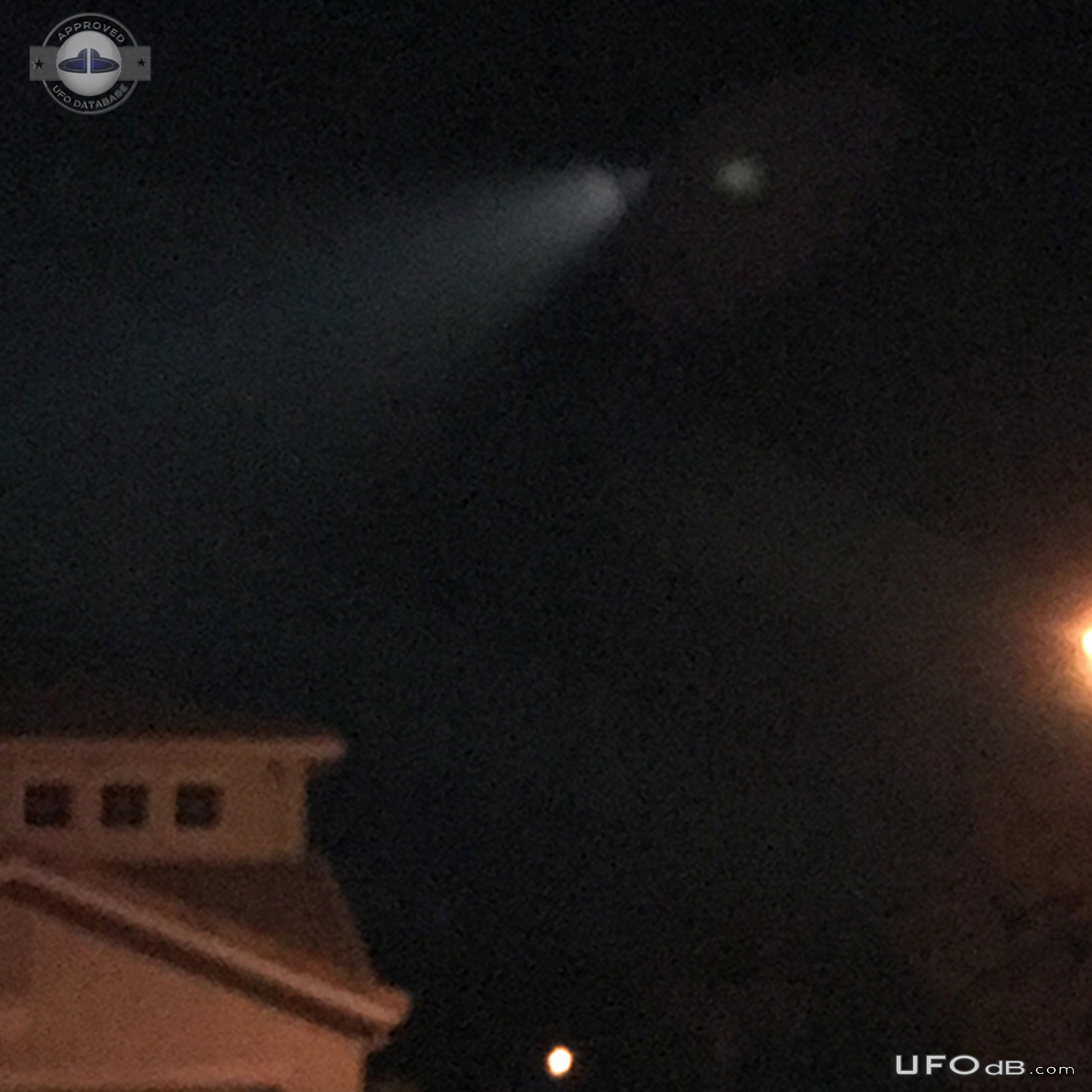 Coming out of my house saw UFO in the sky with a long beam of light -  UFO Picture #758-3