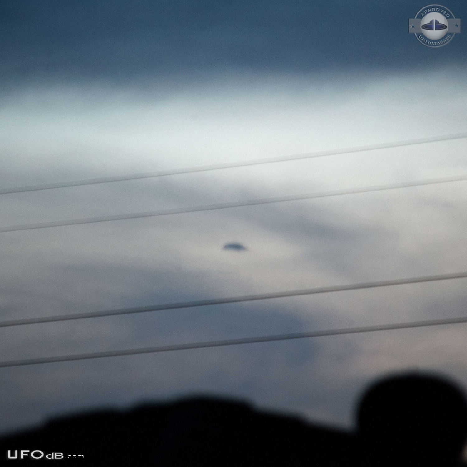 Hovering disc UFO moved then disappeared in the clouds Brisbane Queens UFO Picture #776-2