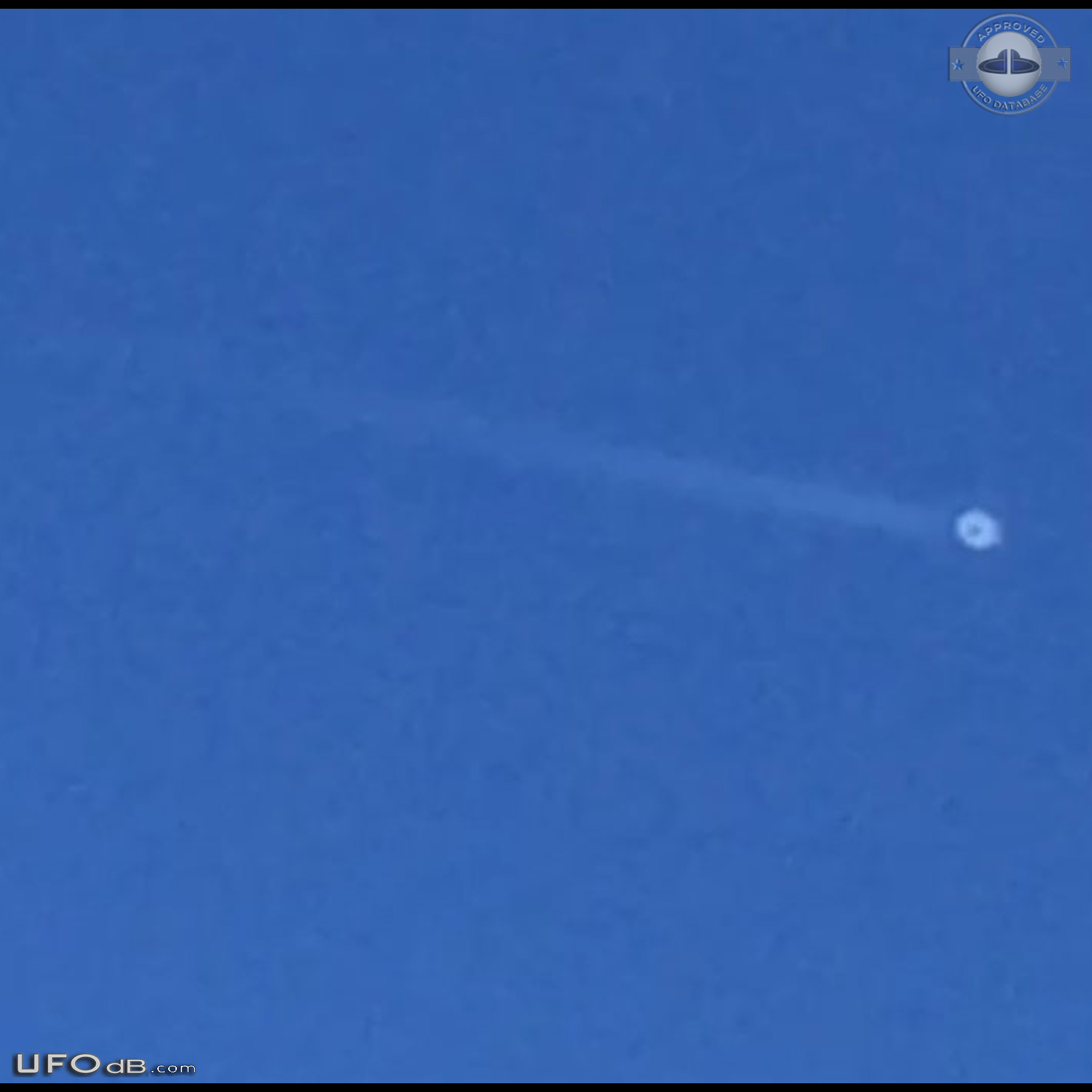 Two separate UFOs. zigzagging then taking off in opposite directions T UFO Picture #779-1