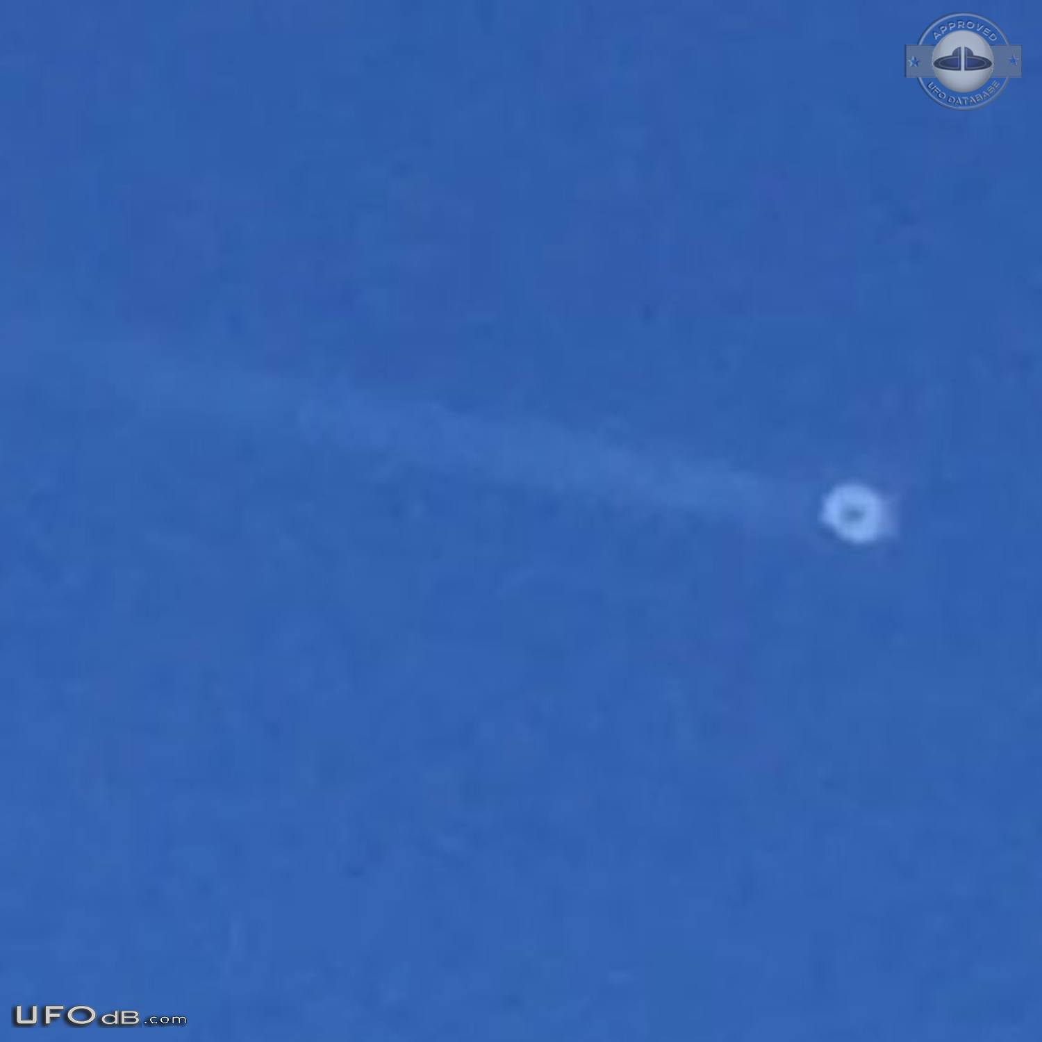Two separate UFOs. zigzagging then taking off in opposite directions T UFO Picture #779-3