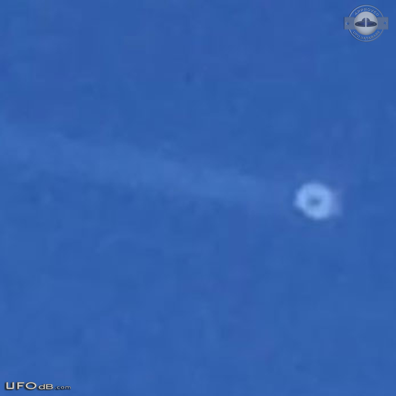 Two separate UFOs. zigzagging then taking off in opposite directions T UFO Picture #779-4