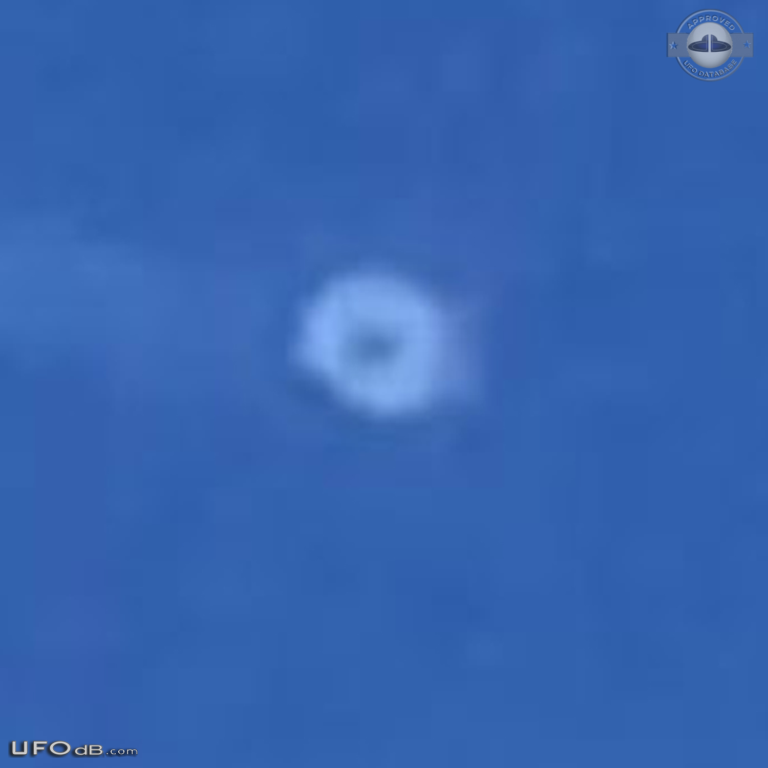 Two separate UFOs. zigzagging then taking off in opposite directions T UFO Picture #779-5