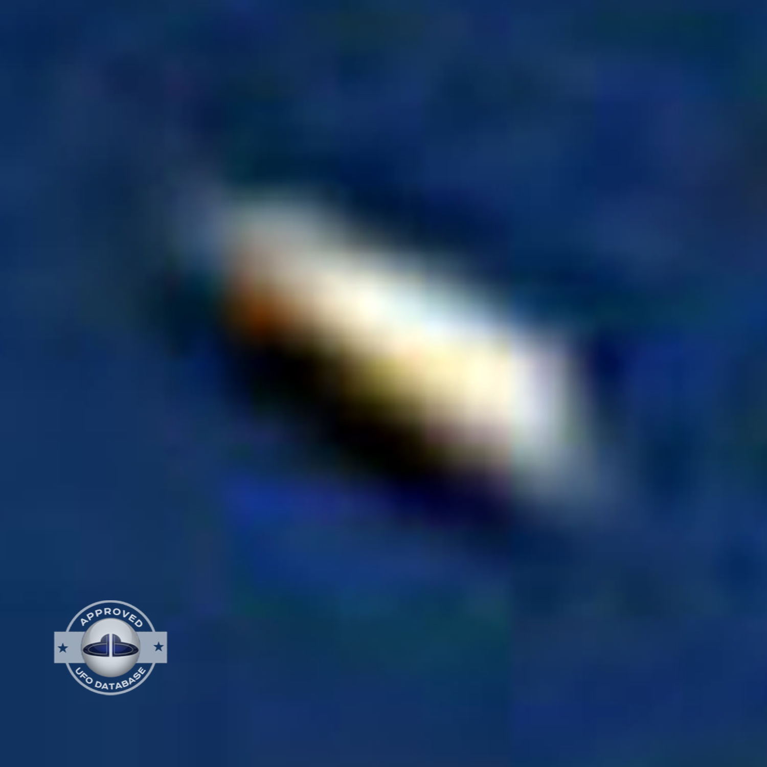 The first ufo can be seen clearly as it passed near old lighthouse UFO Picture #79-6