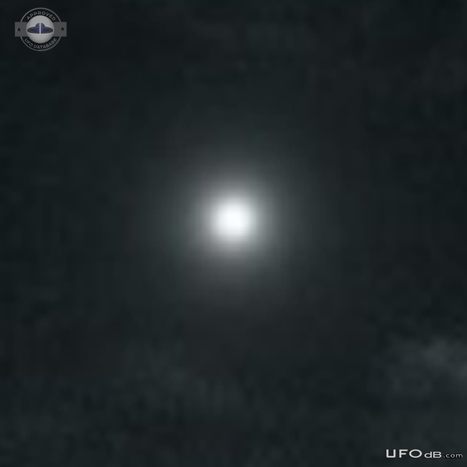 Bright white light UFO hovered continued on path then quickly faded ou UFO Picture #796-4