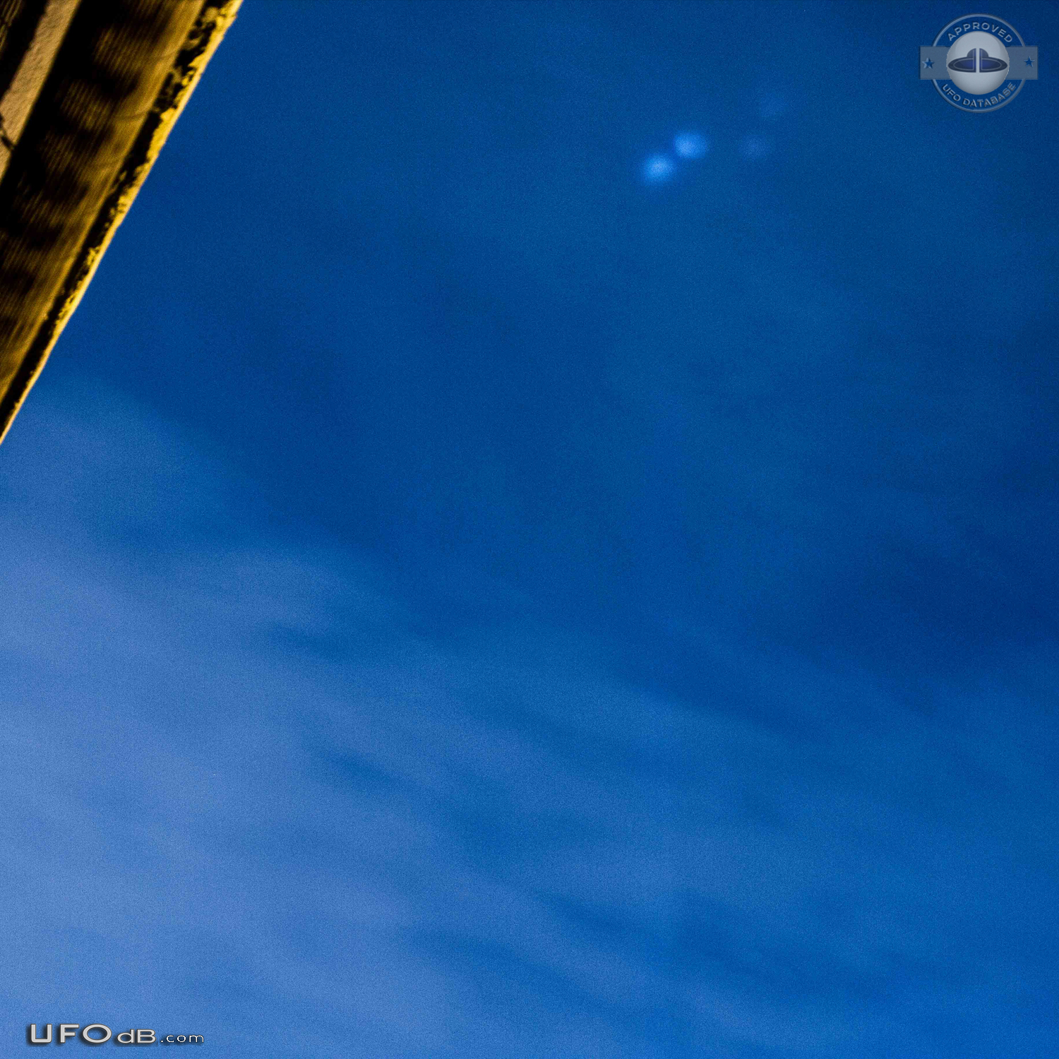 UFO light coming from inside clouds, circle shape. Blinking Pszczyna P UFO Picture #799-1