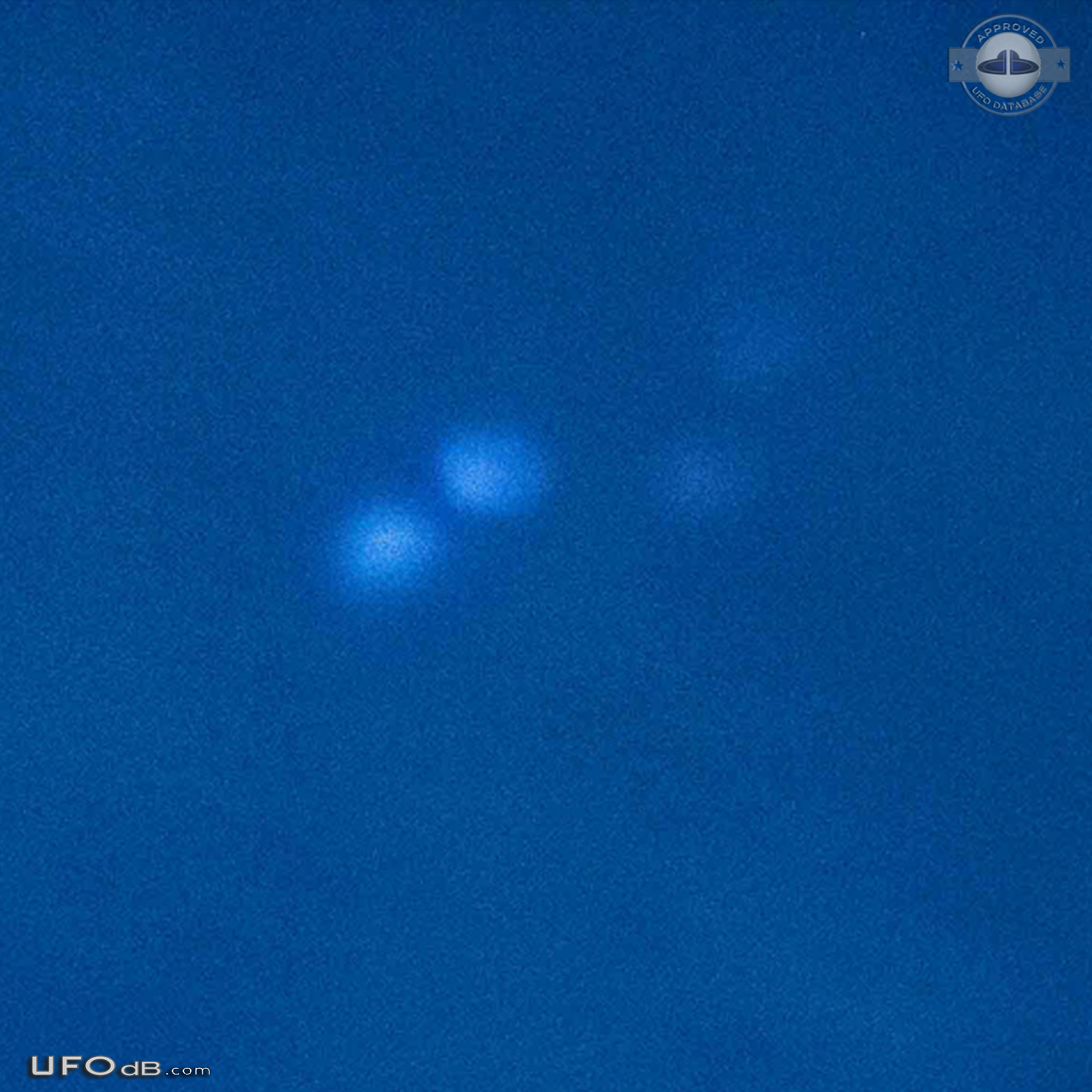 UFO light coming from inside clouds, circle shape. Blinking Pszczyna P UFO Picture #799-3