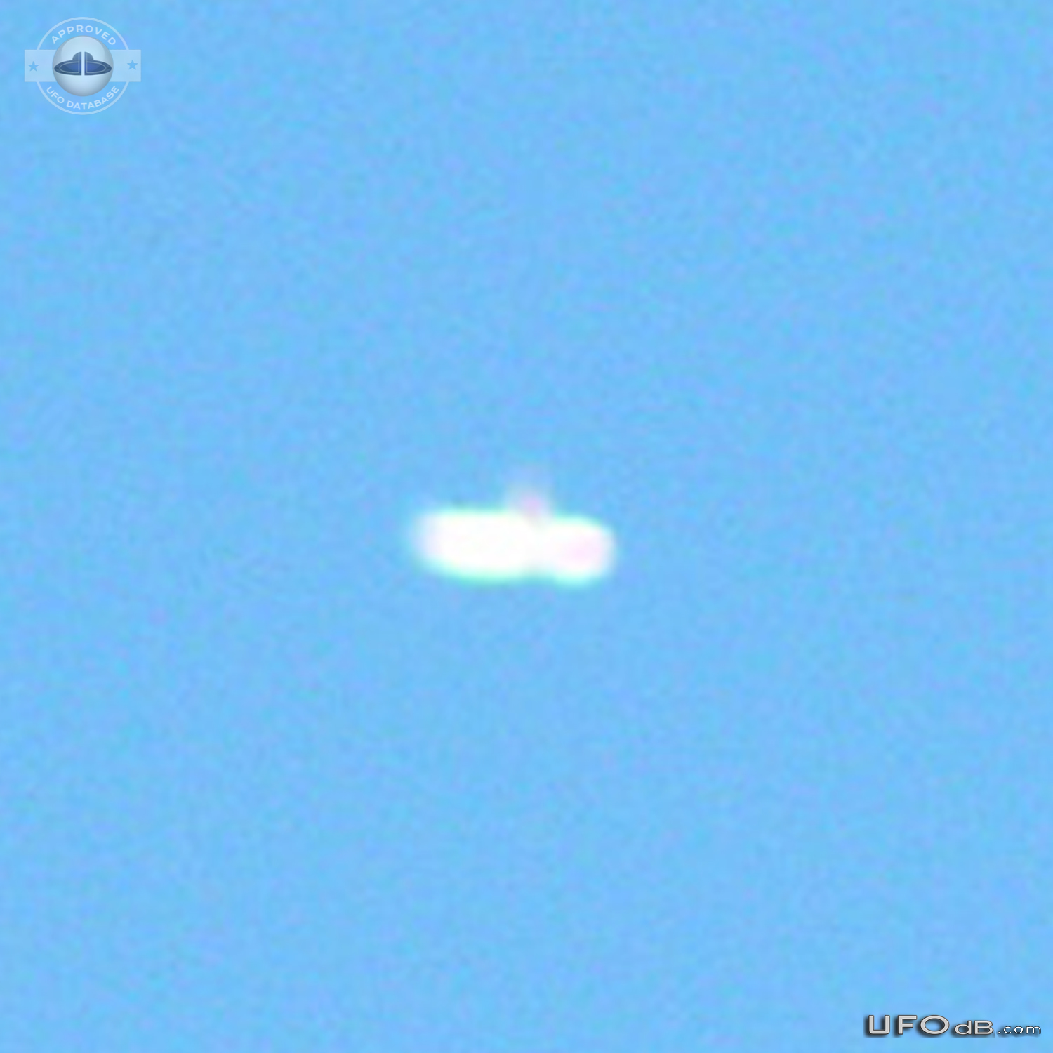 Donut UFO seen over the farm in Alberta Canada in 2004 UFO Picture #835-4