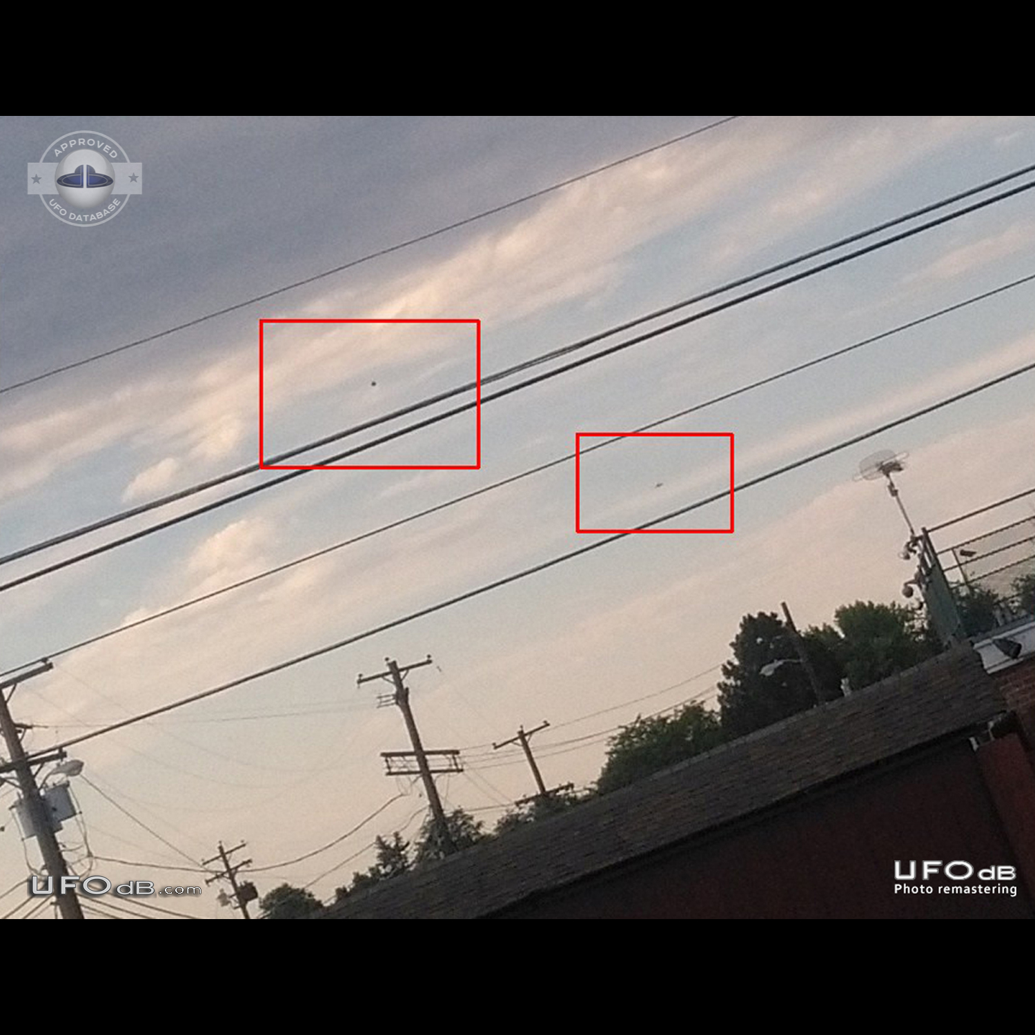 Stationary black orb observed while stuck in traffic in Aurora Colorad UFO Picture #848-1