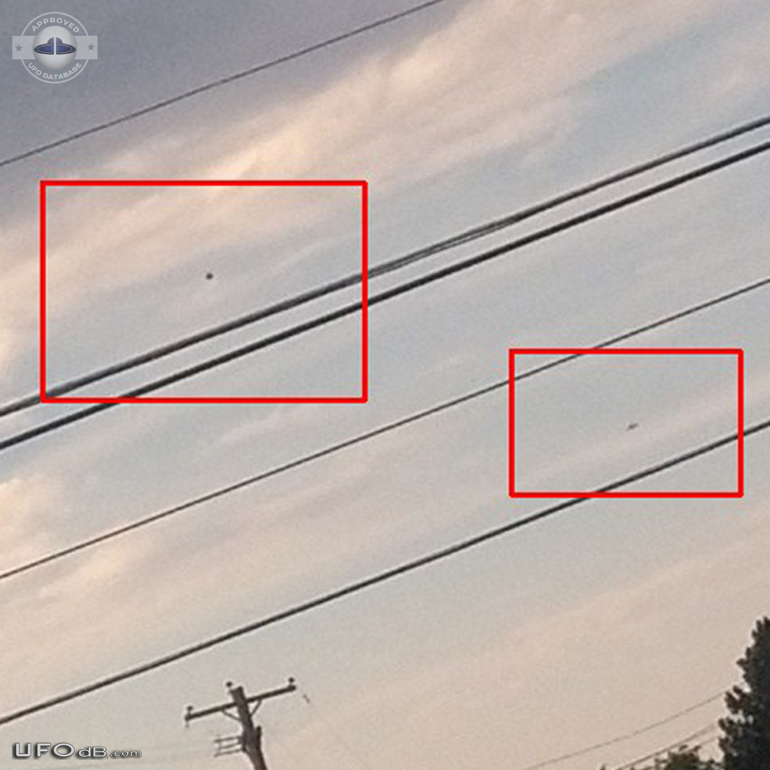 Stationary black orb observed while stuck in traffic in Aurora Colorad UFO Picture #848-2