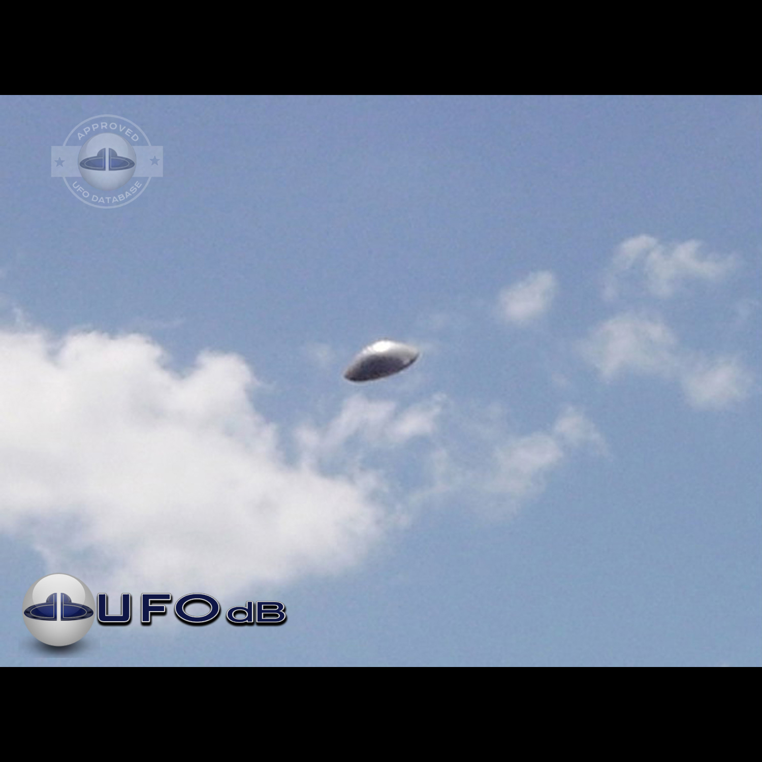 UFO with silver dome shape in clear blue sky. UFO picture Alagamar UFO Picture #86-1
