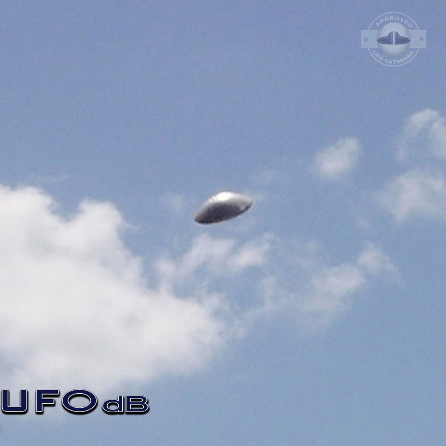 UFO with silver dome shape in clear blue sky. UFO picture Alagamar UFO Picture #86-2