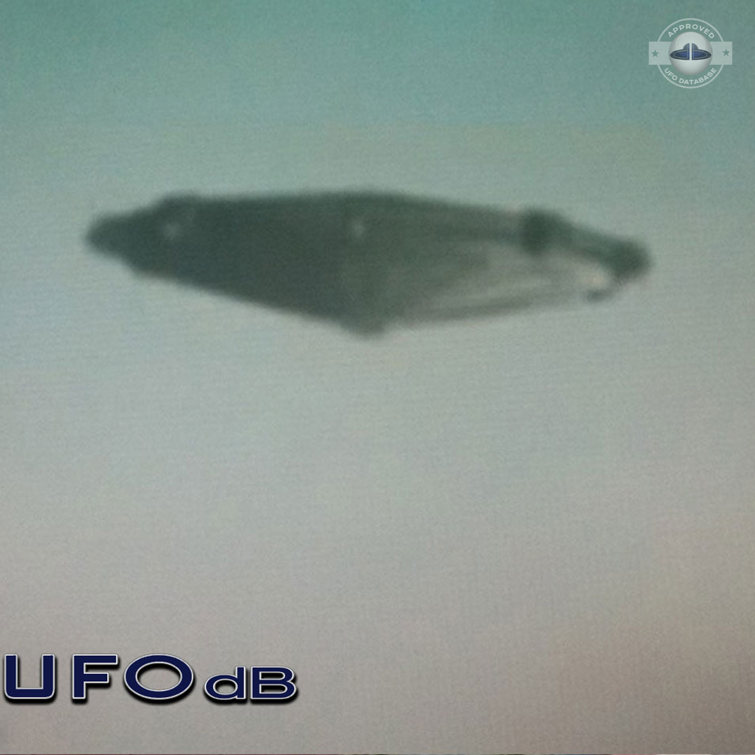 Students saw in amazement the UFO with a metallic flying saucer shape UFO Picture #90-2