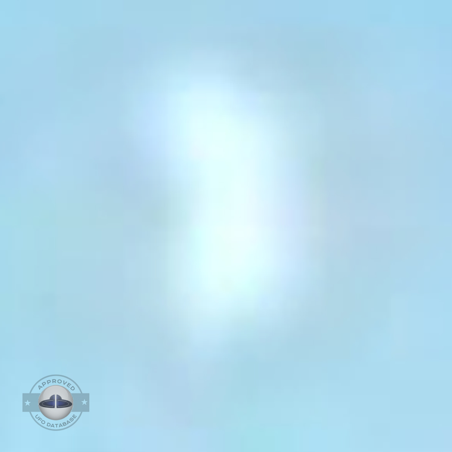 UFO flying over dark blue water near the shore of Lake Michigan USA UFO Picture #97-5