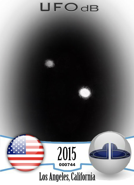 2 extremely bright lit objects stationary in sky for lenghthy period UFO CARD Number 744
