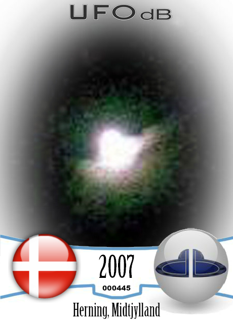 Bright UFO in the night sky of Herning Denmark caught on picture 2007 UFO CARD Number 445